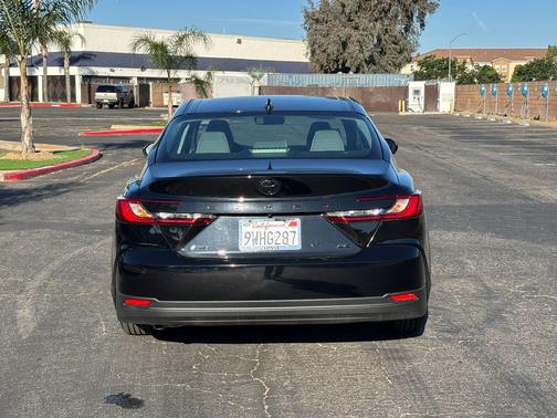 Midnight Black Metallic 2026 Toyota Camry LE