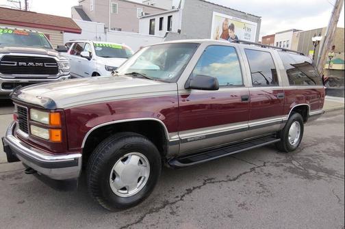 Dark Toreador Red Metallic 1999 GMC Suburban SLT CMI