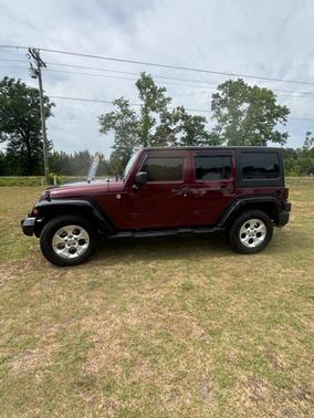 Black Clearcoat 2013 Jeep Wrangler Unlimited Sahara