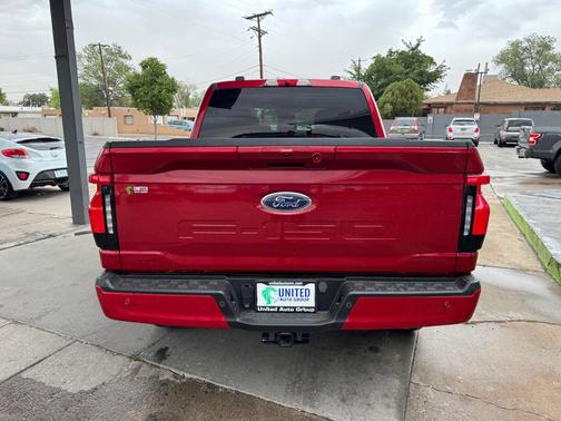 Rapid Red Metallic Tinted Clearcoat 2023 Ford F-150 Lightning XLT