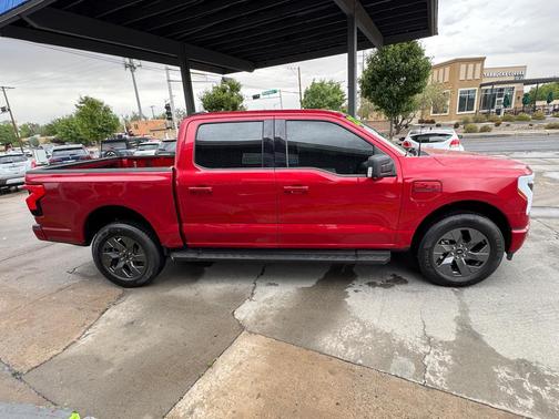 Rapid Red Metallic Tinted Clearcoat 2023 Ford F-150 Lightning XLT