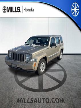 Light Sandstone Metallic Clearcoat 2010 Jeep Liberty Sport