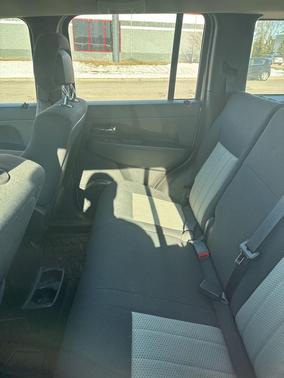 Light Sandstone Metallic Clearcoat 2010 Jeep Liberty Sport