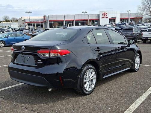 Midnight Black Metallic 2025 Toyota Corolla Hybrid LE