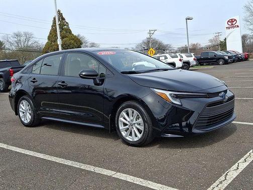 Midnight Black Metallic 2025 Toyota Corolla Hybrid LE