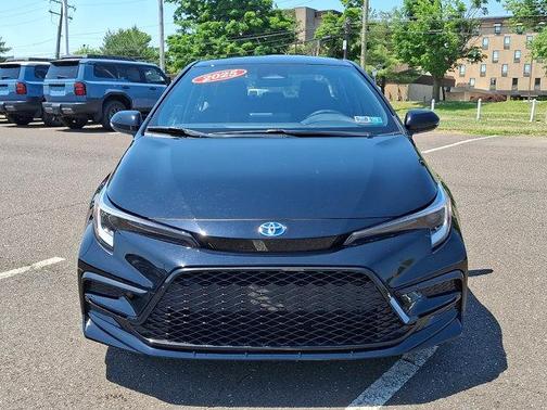 Midnight Black Metallic 2025 Toyota Corolla Hybrid SE