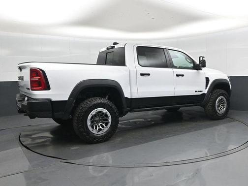 Bright White Clearcoat 2026 RAM 1500 RHO Crew Cab 4x4 5'7' Box