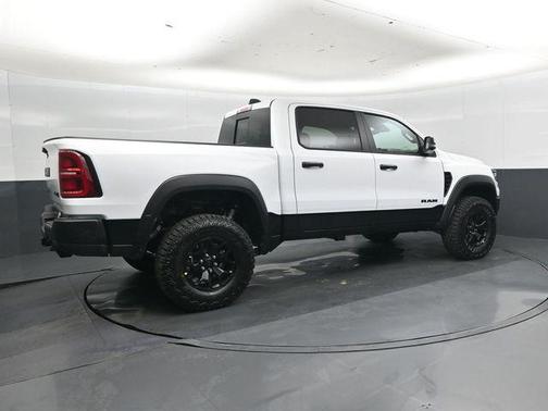 Bright White Clearcoat 2026 RAM 1500 RHO Crew Cab 4x4 5'7' Box