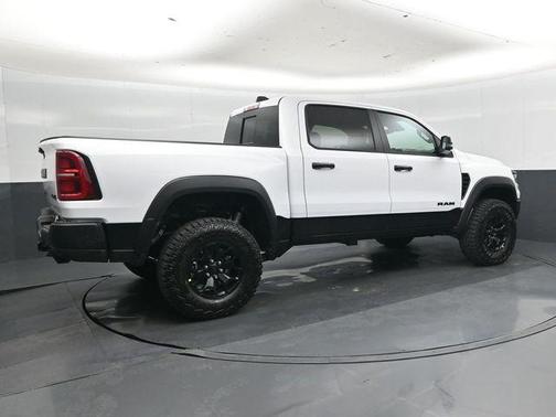 Bright White Clearcoat 2026 RAM 1500 RHO Crew Cab 4x4 5'7' Box