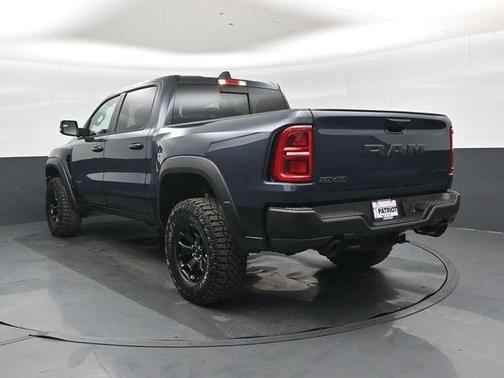 Forged Blue Metallic 2026 RAM 1500 RHO Crew Cab 4x4 5'7' Box