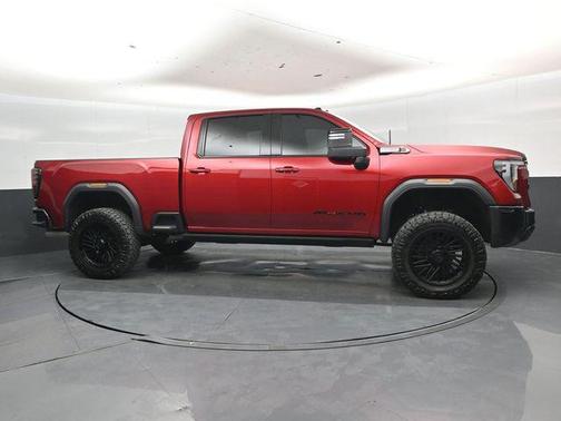 Volcanic Red Tintcoat 2025 GMC Sierra 2500 AT4X