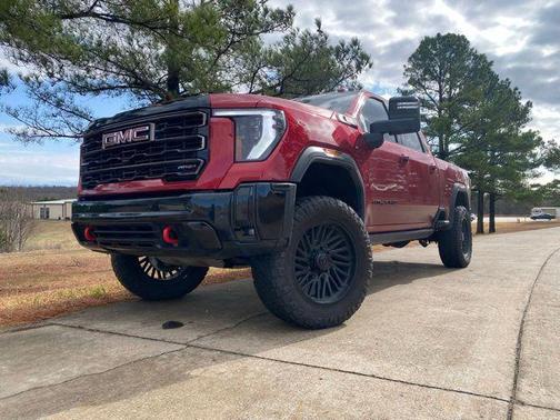 Volcanic Red Tintcoat 2025 GMC Sierra 2500 AT4X