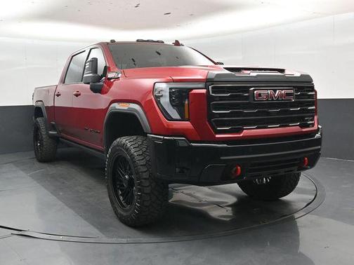 Volcanic Red Tintcoat 2025 GMC Sierra 2500 AT4X