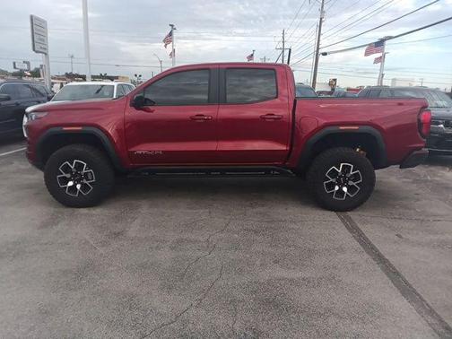 Volcanic Red Tintcoat 2024 GMC Canyon AT4X