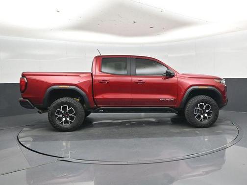 Volcanic Red Tintcoat 2024 GMC Canyon AT4X