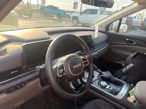 Ceramic Silver 2025 Kia Carnival Hybrid EX