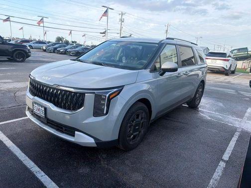 Ceramic Silver 2025 Kia Carnival Hybrid EX