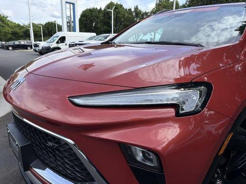 Sunrise Red Metallic 2024 Buick Encore GX Sport Touring