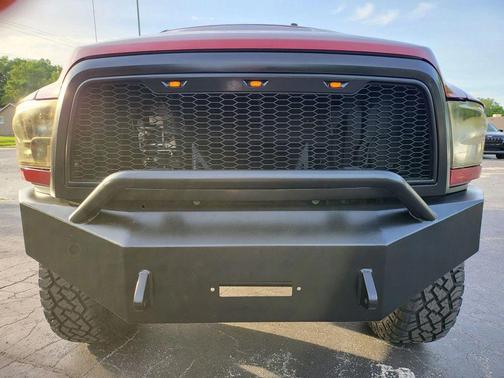 Red 2015 RAM 2500 Tradesman