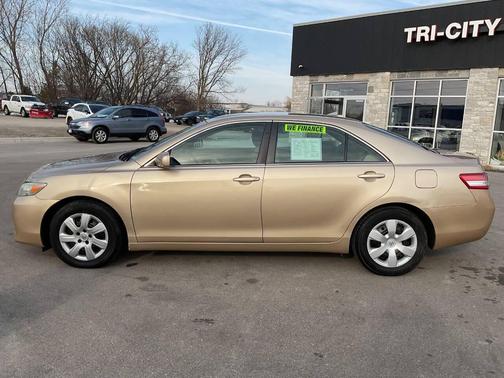 Tan 2010 Toyota Camry LE