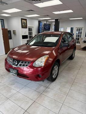 Orange 2013 Nissan Rogue S