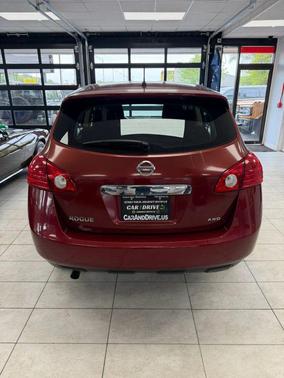 Orange 2013 Nissan Rogue S