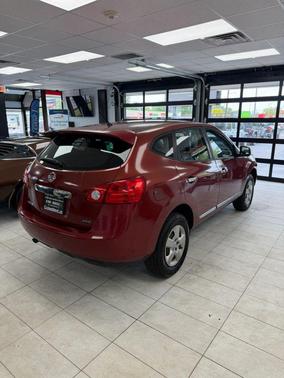 Orange 2013 Nissan Rogue S