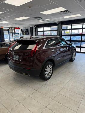Rosewood Metallic 2023 Cadillac XT4 Sport