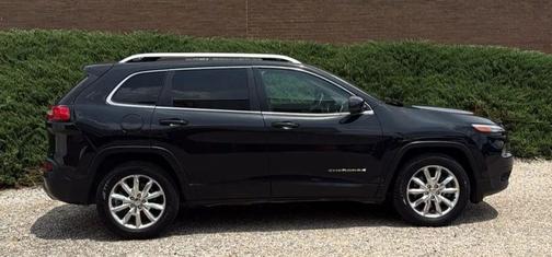 Brilliant Black Crystal Pearlcoat 2015 Jeep Cherokee Sport