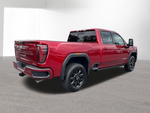 Volcanic Red Tintcoat 2026 GMC Sierra 2500 AT4