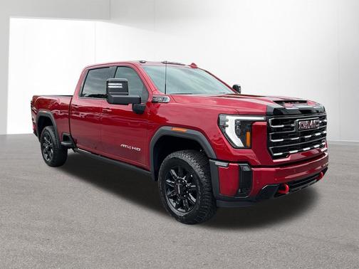 Volcanic Red Tintcoat 2026 GMC Sierra 2500 AT4