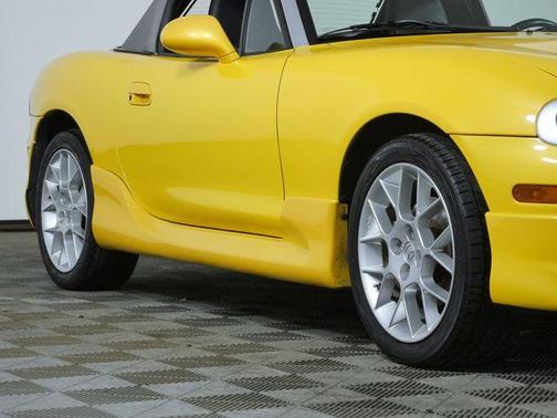 Yellow 2002 Mazda MX-5 Miata