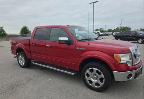 Red 2010 Ford F-150 Lariat