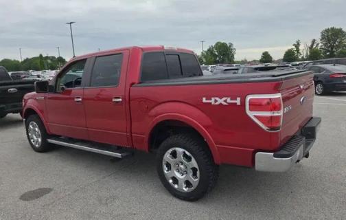 Red 2010 Ford F-150 Lariat