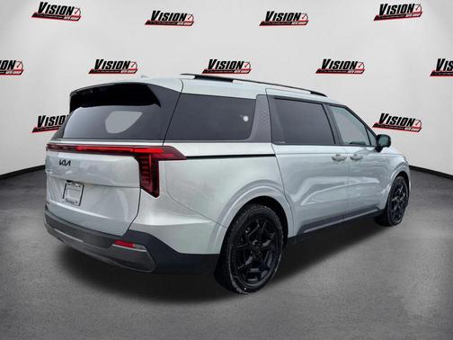 Ivory Silver 2025 Kia Carnival SX Prestige