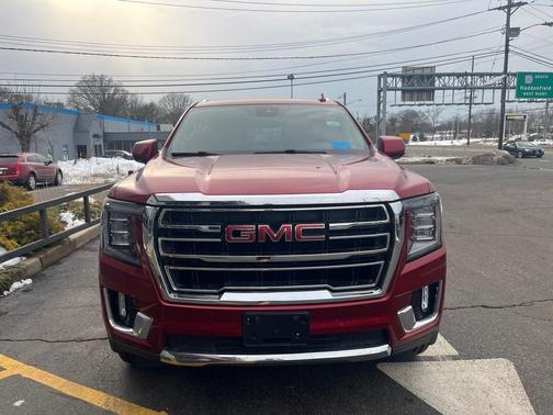 Volcanic Red Tintcoat 2023 GMC Yukon SLT