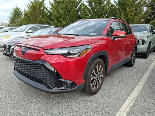 Barcelona Red Metallic 2024 Toyota Corolla Cross Hybrid SE