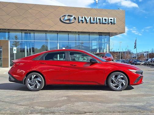 Ultimate Red Metallic 2025 Hyundai ELANTRA HEV SEL Sport