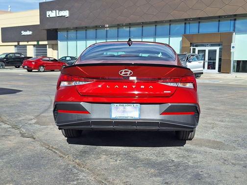 Ultimate Red Metallic 2025 Hyundai ELANTRA HEV SEL Sport