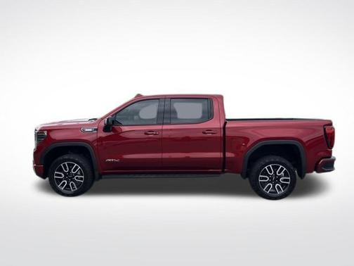 Volcanic Red Tintcoat 2026 GMC Sierra 1500 AT4