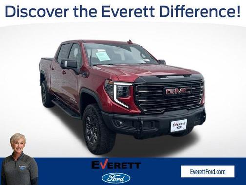 Volcanic Red Tintcoat 2024 GMC Sierra 1500 AT4X