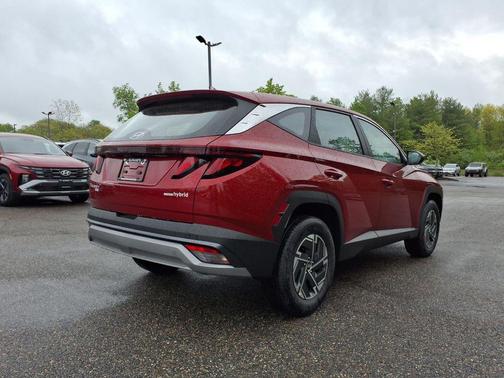 Red 2026 Hyundai TUCSON Hybrid Blue SE