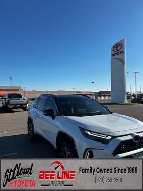 Wind Chill Pearl/Midnight Black Metallic 2025 Toyota RAV4 Hybrid SE