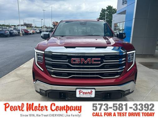 Volcanic Red 2025 GMC Sierra 1500 SLT