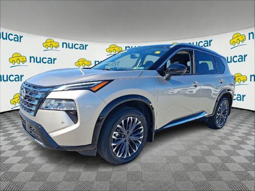 Gold 2024 Nissan Rogue Platinum