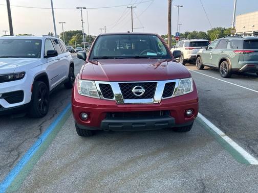 Red 2014 Nissan Frontier SV