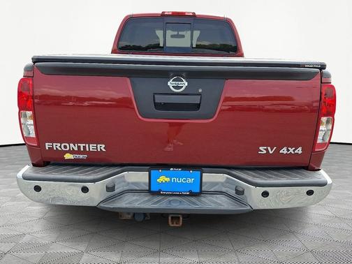 Red 2014 Nissan Frontier SV