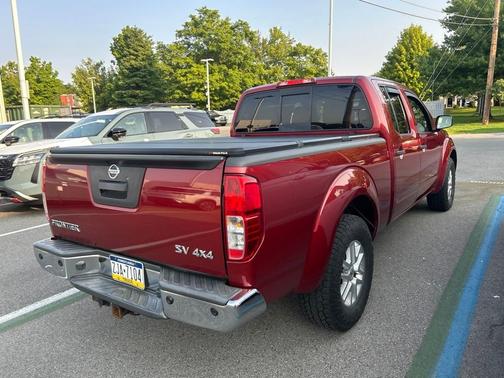 Red 2014 Nissan Frontier SV