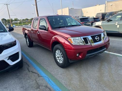 Red 2014 Nissan Frontier SV