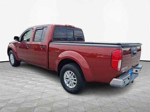 Red 2014 Nissan Frontier SV
